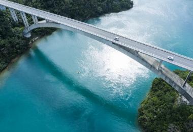 Bridge over a bright blue river