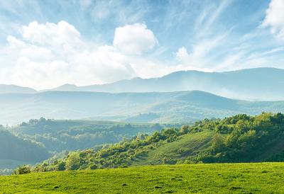 Rolling hills and mountain view on horizon