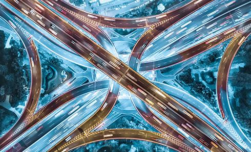 Aerial view of diamond interchange at night